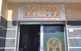 insegna tattoo skilled